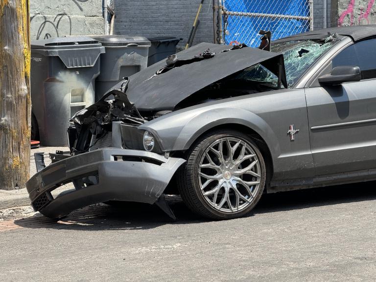 E 138 and St. Ann’s: a teenager in the road