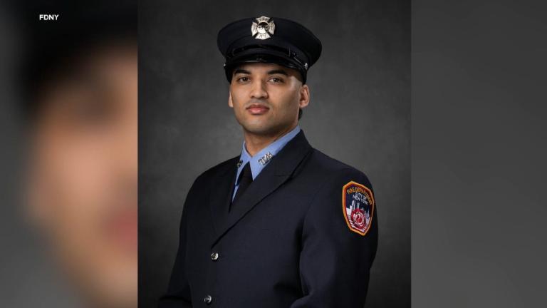 Early morning on 2nd Avenue, a cyclist goes down